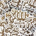 stack of classic logo stickers in white and gold