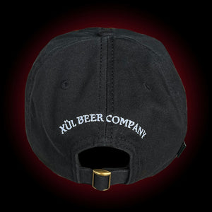 Black dad hat with white fanghead on front and white Xul logo on the back