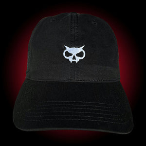 Black dad hat with white fanghead embroidered on the front and Xul logo on the back
