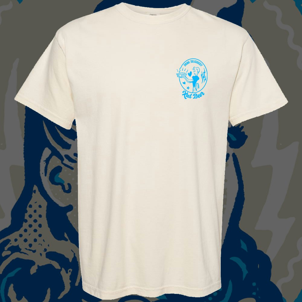 Comfort Colors tan shirt with our Betty's Cobbler can art on the left front breast.