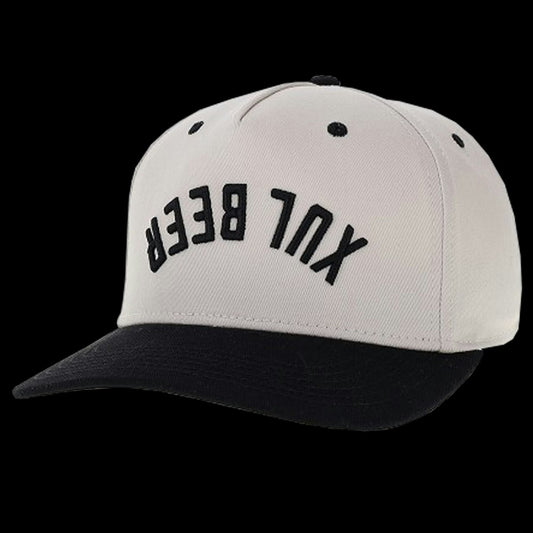 Black and white snapback twill Legacy Rally Cap with "Xul Beer" written upside down across the front.