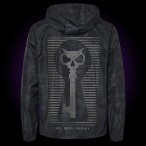 black camo windbreaker with our faded keyhole icon on the back
